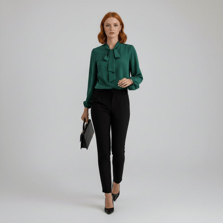 Comfortable yet elegant women's long sleeve blouse with a beautiful bow tie neck and fashionable puff sleeves.