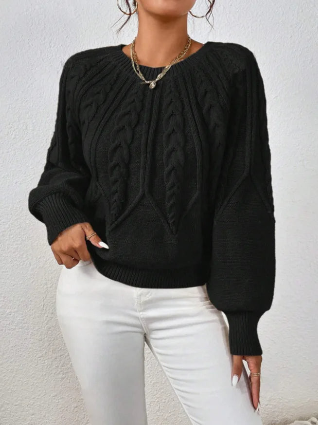 Versatile women's top: stylish cable knit sweater with elegant balloon sleeves.