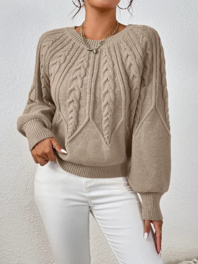 Chic women's cropped cable knit sweater featuring stylish balloon sleeves & cozy knitwear.