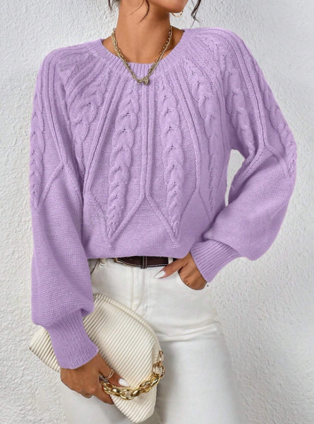 Elegant women's top: cable knit sweater showcasing unique balloon sleeves & cozy style.