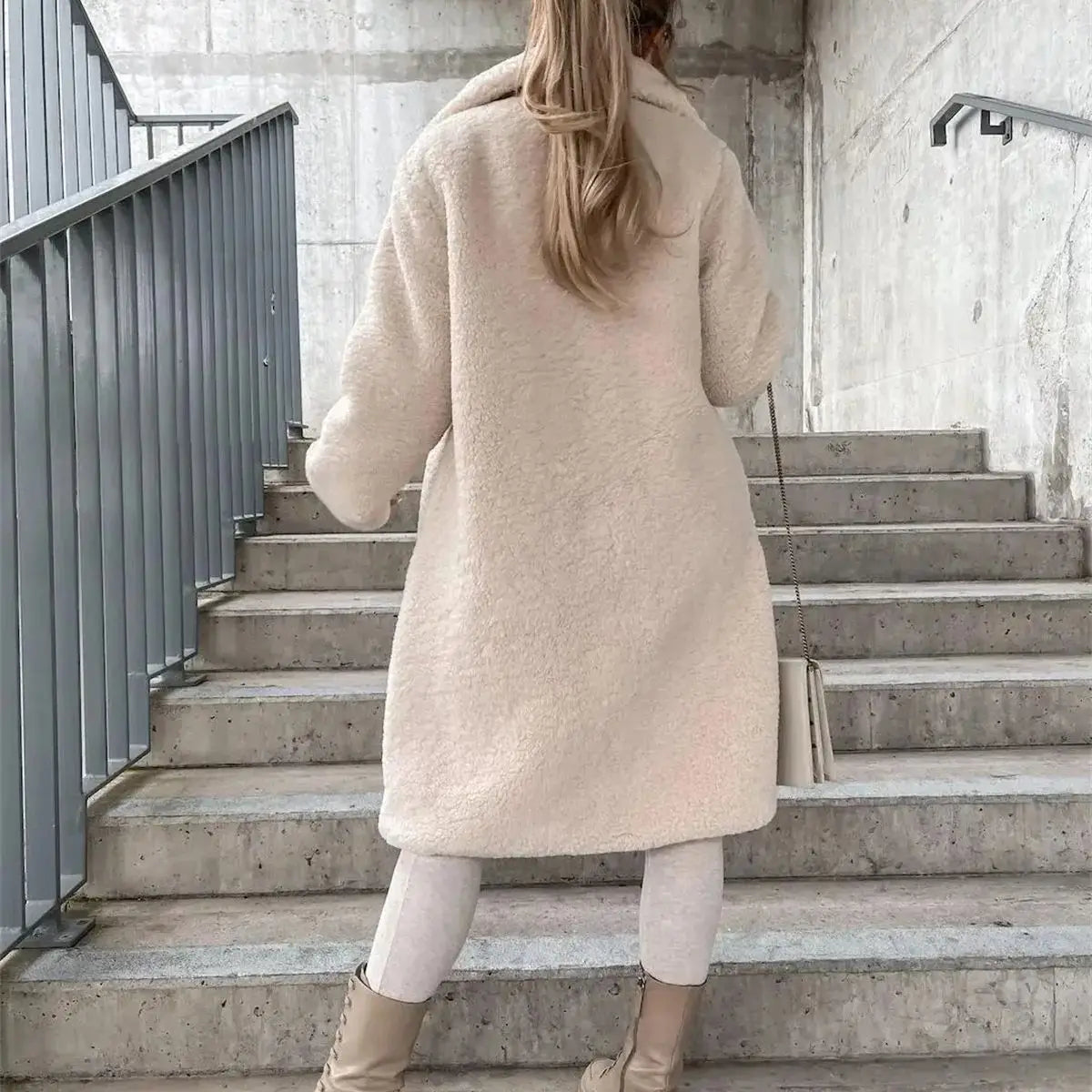Women's button-front long coat, elegant casual outerwear perfect as a fall jacket or winter layer.
