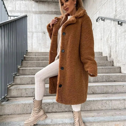 Classic black women's elegant long coat with a relaxed fit, perfect casual outerwear for layering.