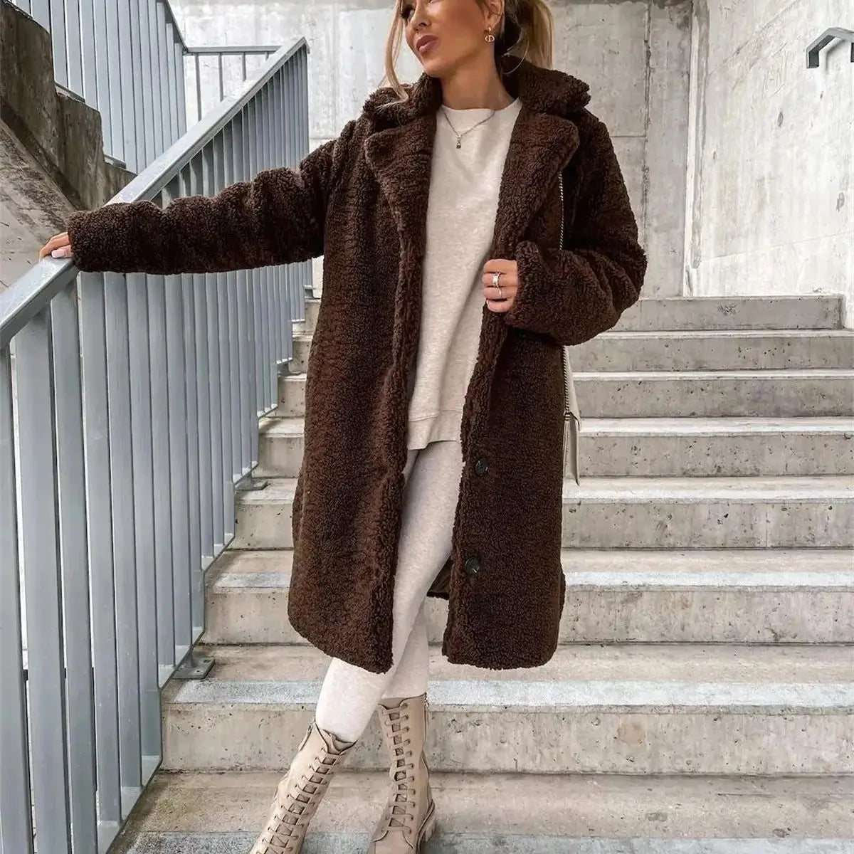 Women's elegant casual fall jacket, a cozy and stylish long coat designed for winter fashion layering.