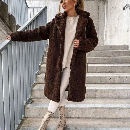 Women's elegant casual fall jacket, a cozy and stylish long coat designed for winter fashion layering.