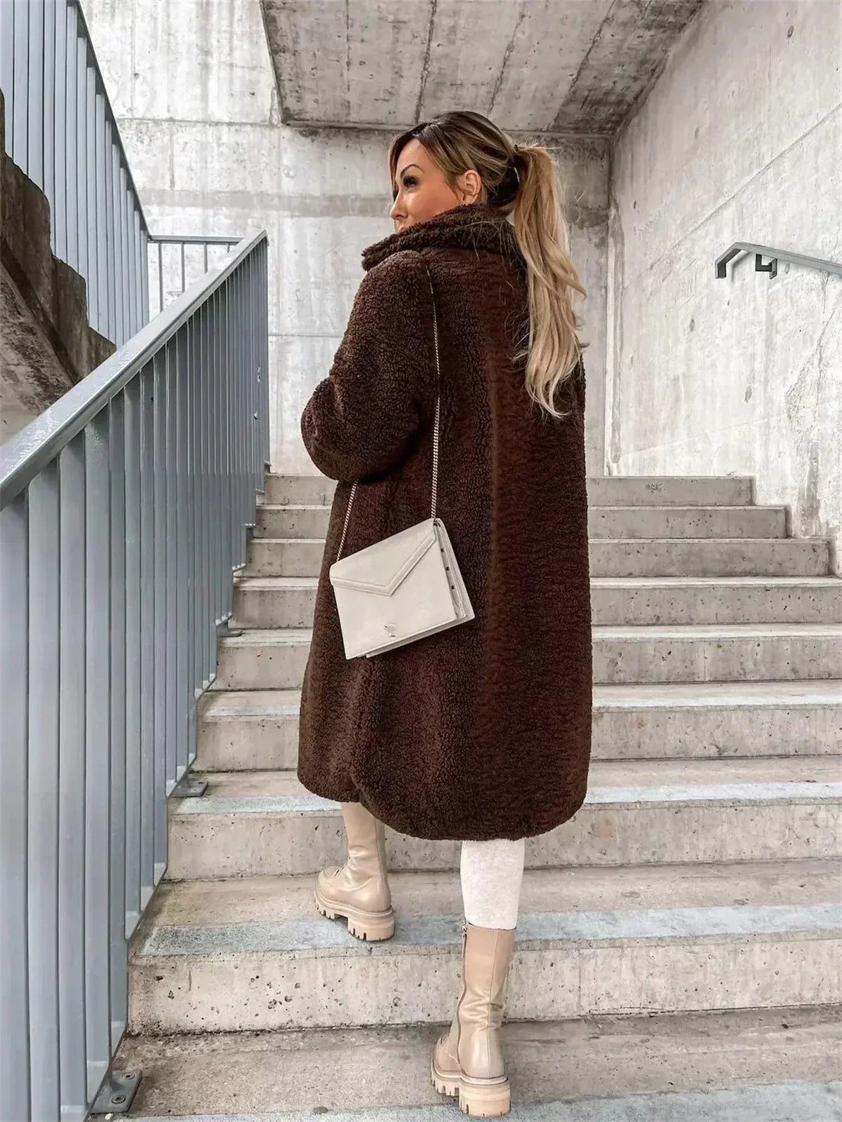 Comfortable women's long outerwear coat, a relaxed fit elegant casual piece for everyday style.
