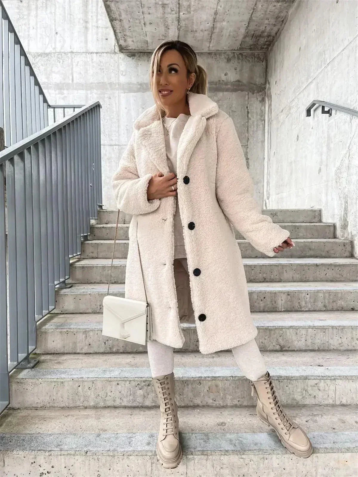 Stylish women's long coat, a versatile layering piece. Elegant casual outerwear with a timeless design.