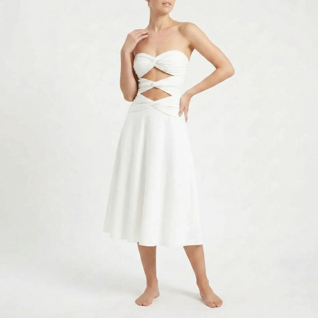 Gradient women's cutout swimsuit with flowing skirt, elegant beach and resort outfit.