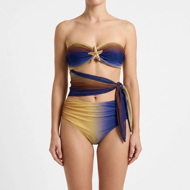 Stylish women's two-piece cutout swimsuit & long flowing skirt set for resort wear.