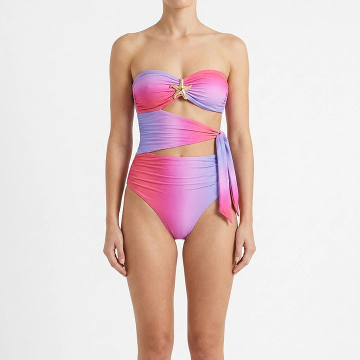 Women's elegant two-piece cutout swimsuit and flowing skirt resort set, summer fashion.