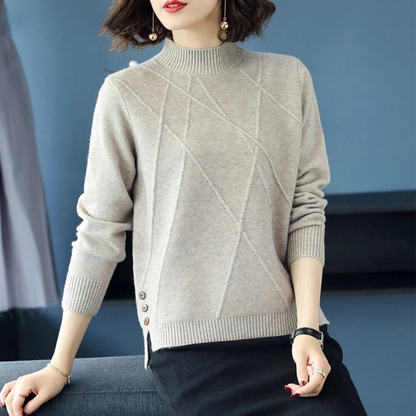 Side profile of an elegant women's diamond-knit turtleneck sweater, highlighting comfort and style.