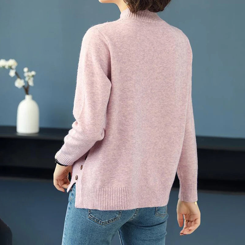 Detailed view of the unique diamond knit pattern on an elegant women's turtleneck sweater.