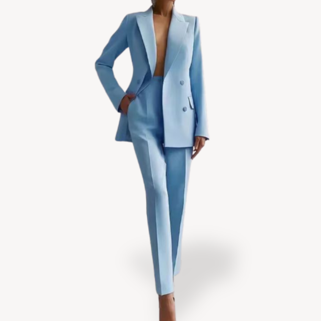 Formal women's pant suit set featuring a double-breasted blazer & well-fitted trousers for occasion wear.
