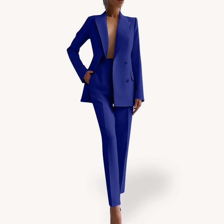 Professional women's double-breasted pant suit set. Elegant tailored blazer and trousers for sophisticated attire.
