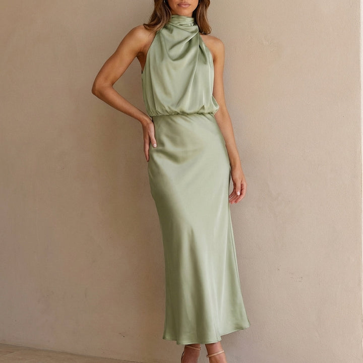 Elegant women's party dress: draped halter neck, blouson waist, midi length. Perfect for evenings.