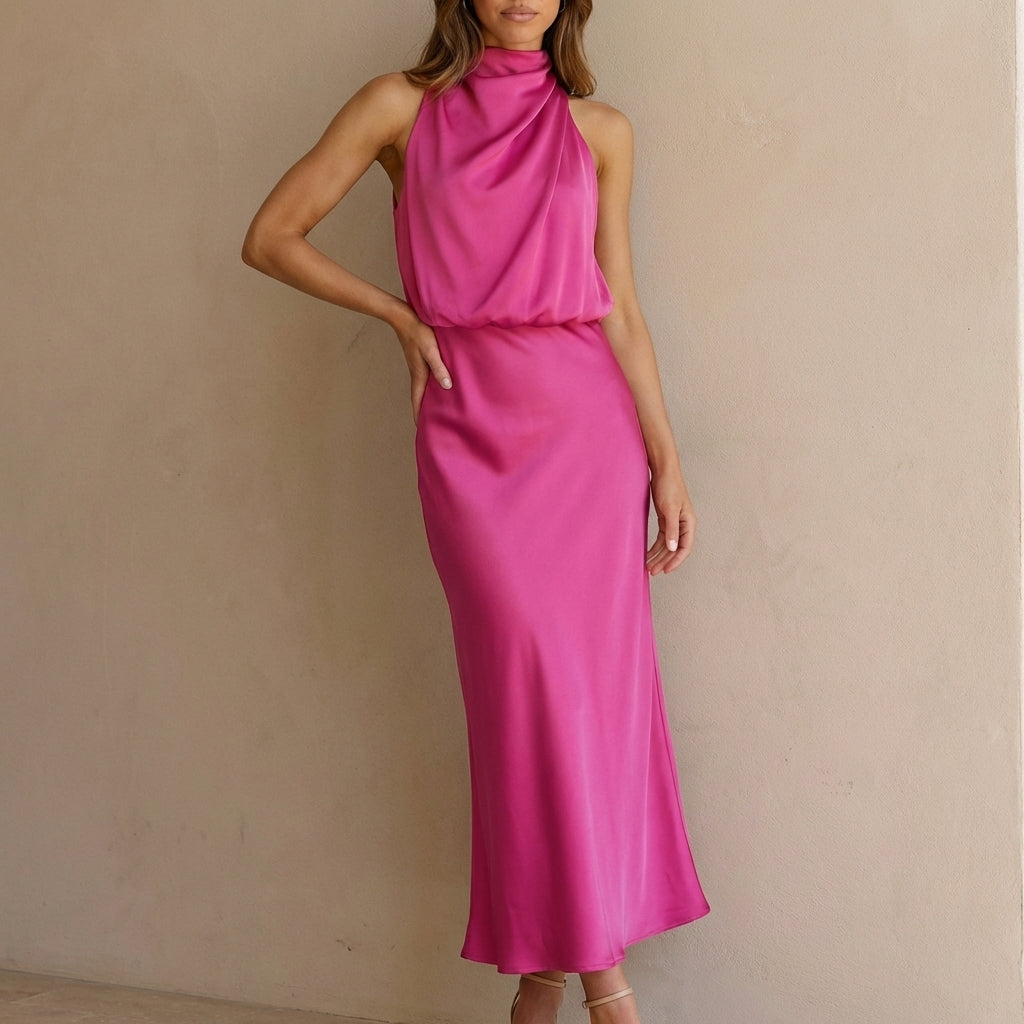 Sleeveless women's midi dress. Draped halter neck & blouson waist. Elegant for evening parties.