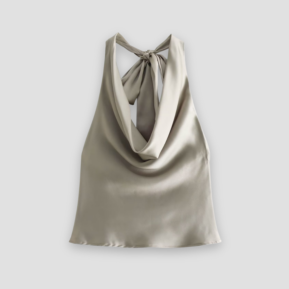 Sophisticated women's halter neck sleeveless blouse with beautiful draped design.