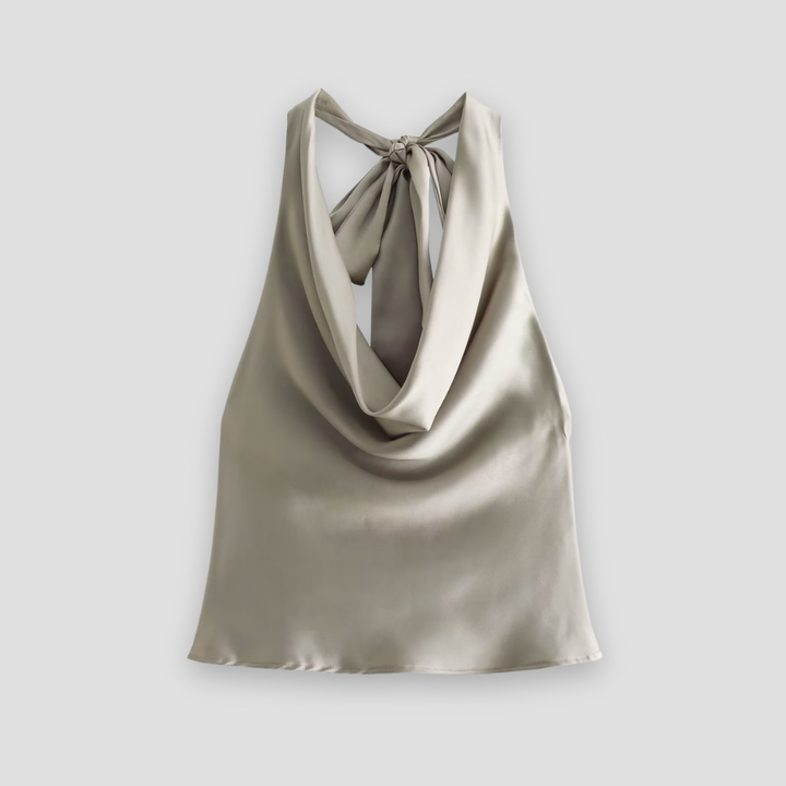Sophisticated women's halter neck sleeveless blouse with beautiful draped design.