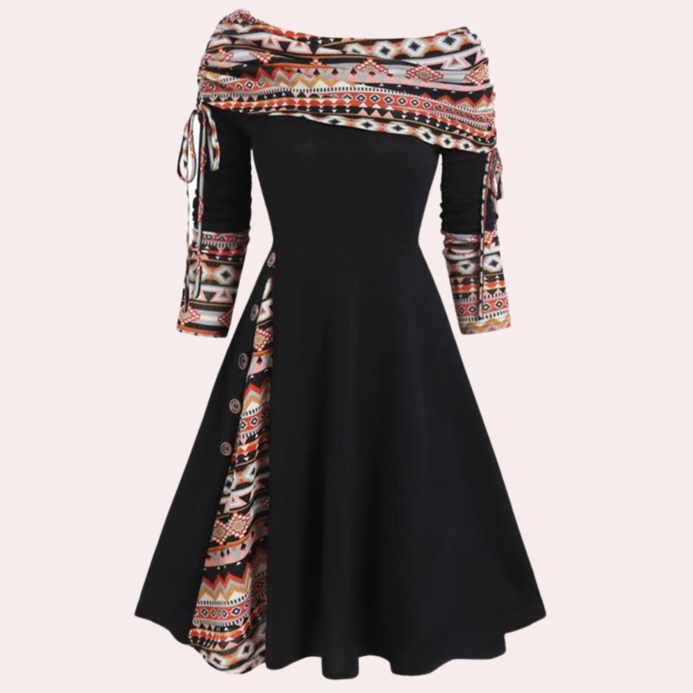 Close-up of Elara A-line dress, highlighting the chic accent print & elegant flowy fabric. Modern women's fashion.