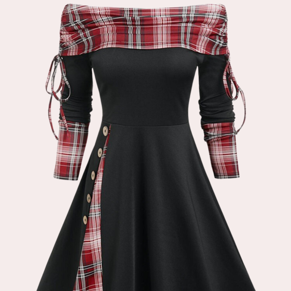 Woman modeling Elara elegant A-line dress with sophisticated accent print. Ideal for casual or formal events.