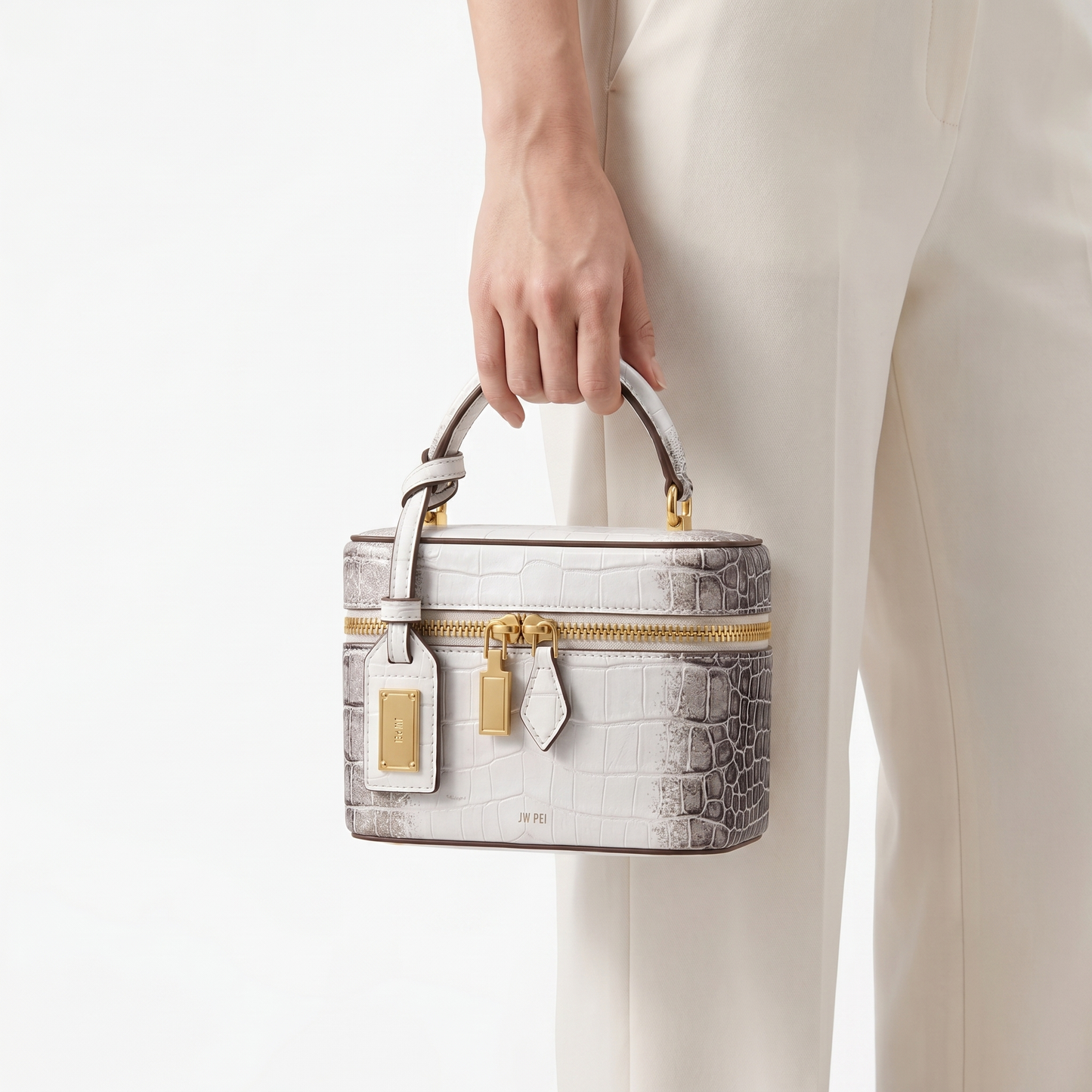 Stylish daily carry women's shoulder bag, crocodile print faux leather design.