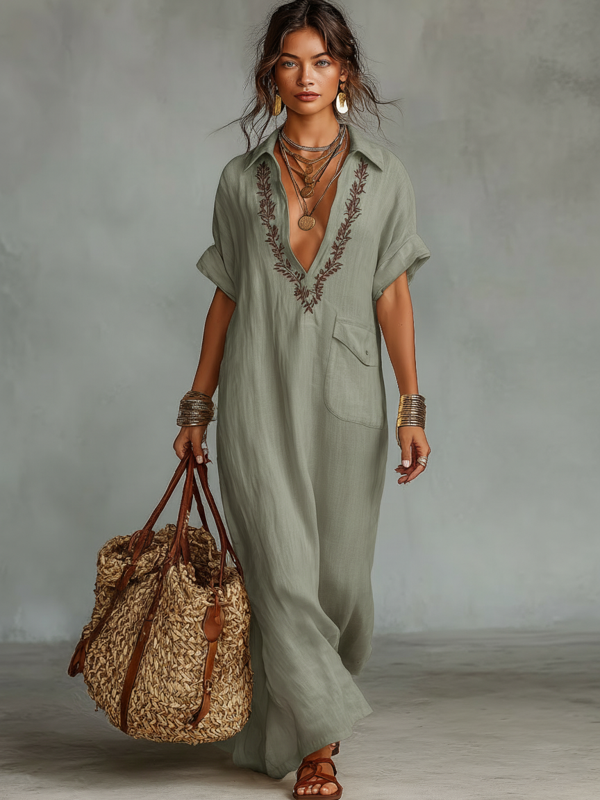 Stylish women's maxi shirt dress with intricate embroidery, short sleeves, suitable for summer casual or elegant wear.