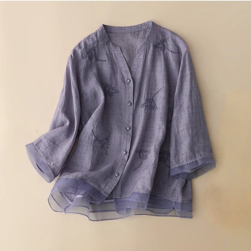 Stylish women's embroidered V-neck top for elegant & casual looks. Breathable spring/summer blouse.
