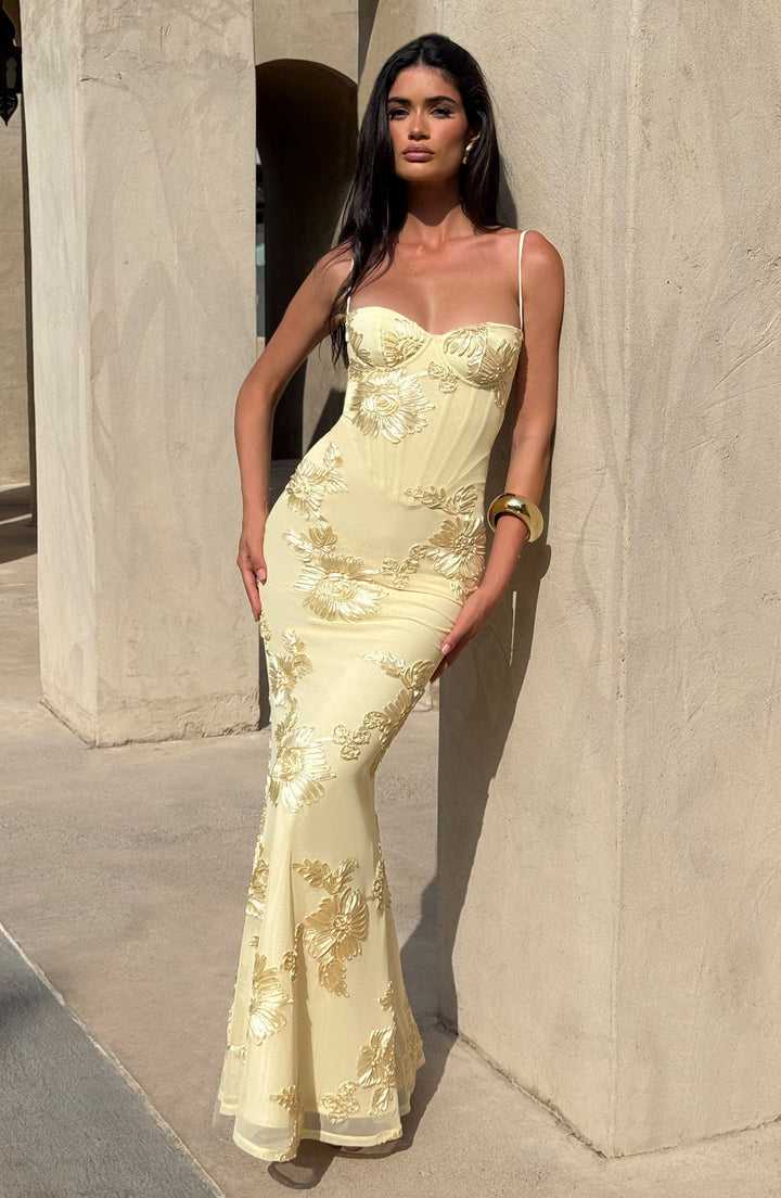 Elegant wedding guest floral appliqué corset mermaid maxi dress. Perfect formal gown with spaghetti straps.