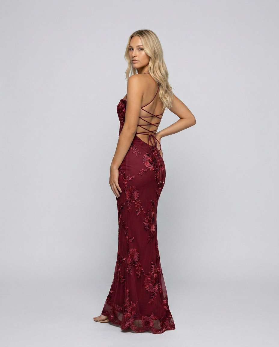 Fashionable women's floral appliqué maxi dress, boasting a trendy lace-up back design. Elegant party wear.