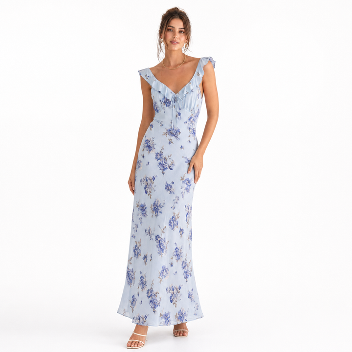 Effortless women's summer floral beach dress with a chic backless design. Perfect vacation outfit.