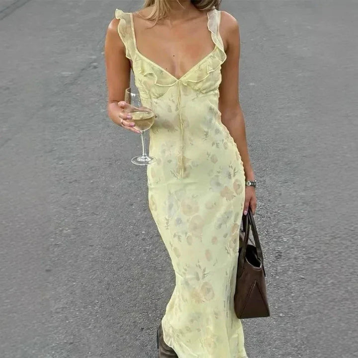 Vibrant floral print women's backless beach dress, a must-have for your summer vacation wardrobe.