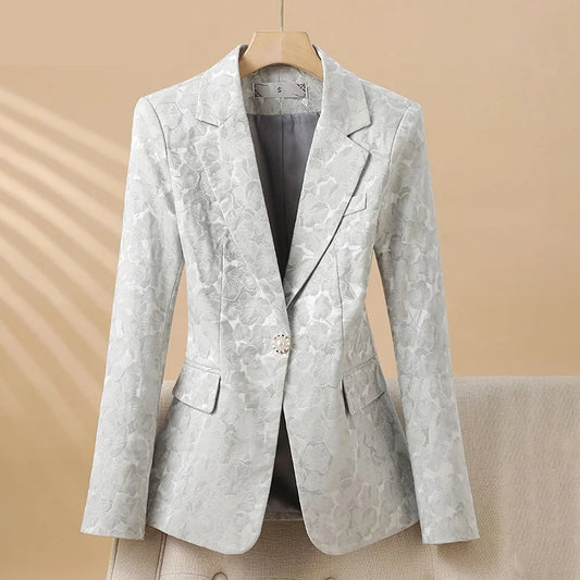 Women's elegant floral blazer with tailored fit and pearl buttons, perfect for office or formal wear.