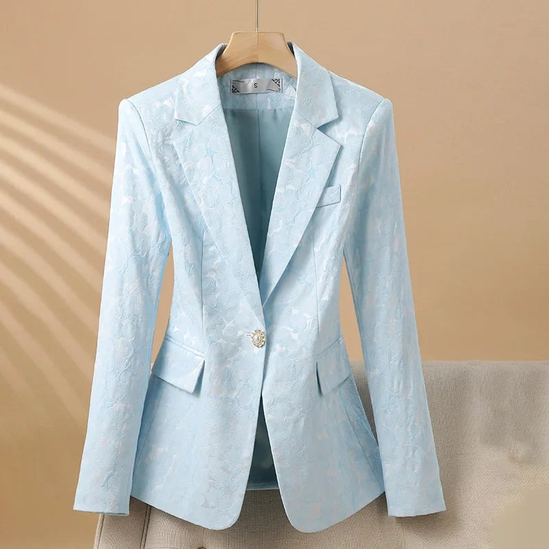 Stylish women's tailored floral blazer with elegant pearl buttons, ideal for office attire or evening events.