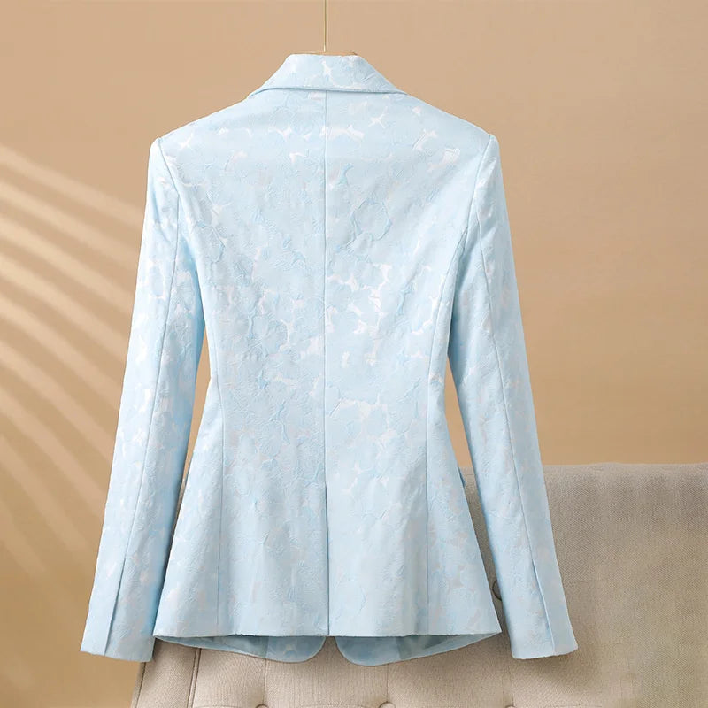 Elegant women's tailored blazer featuring a sophisticated floral texture and classic pearl button closure.