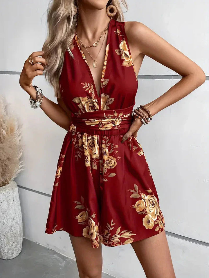 Open back floral mini dress romper, elegant & flowy for women's summer fashion & vacation outfits.