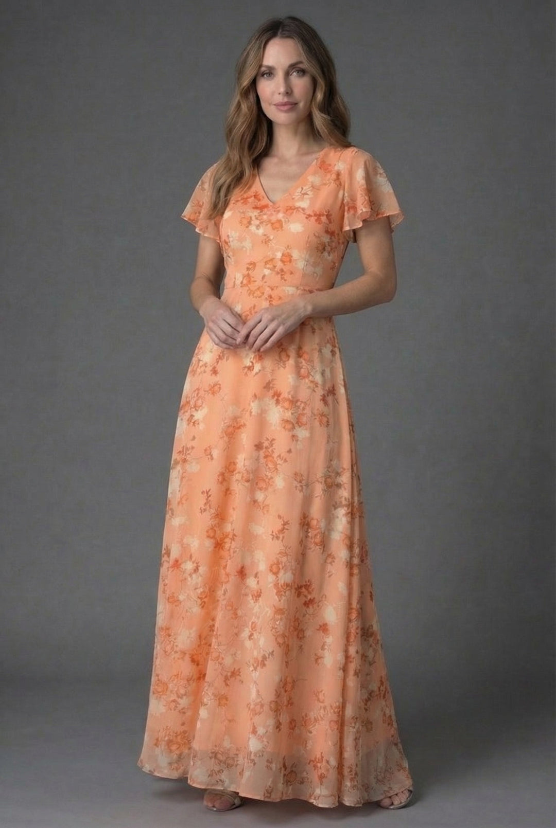 Women's elegant floral flutter sleeve V-neck maxi dress, perfect for spring parties.