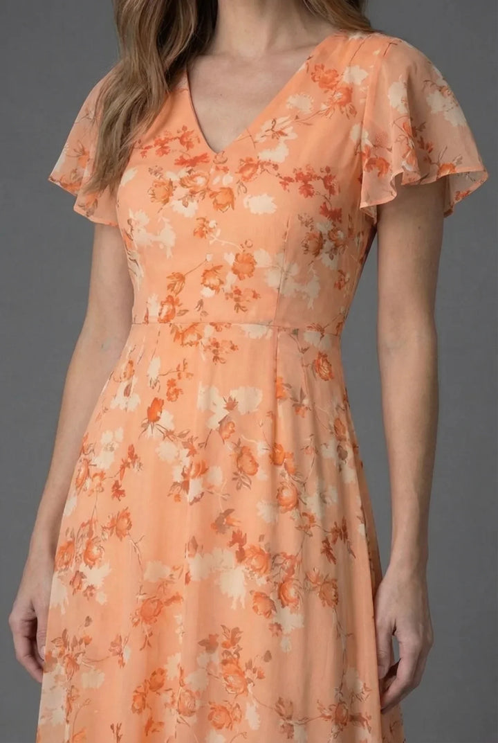Floral print maxi dress for women, V-neck, flutter sleeves. Ideal as a wedding guest or party dress.
