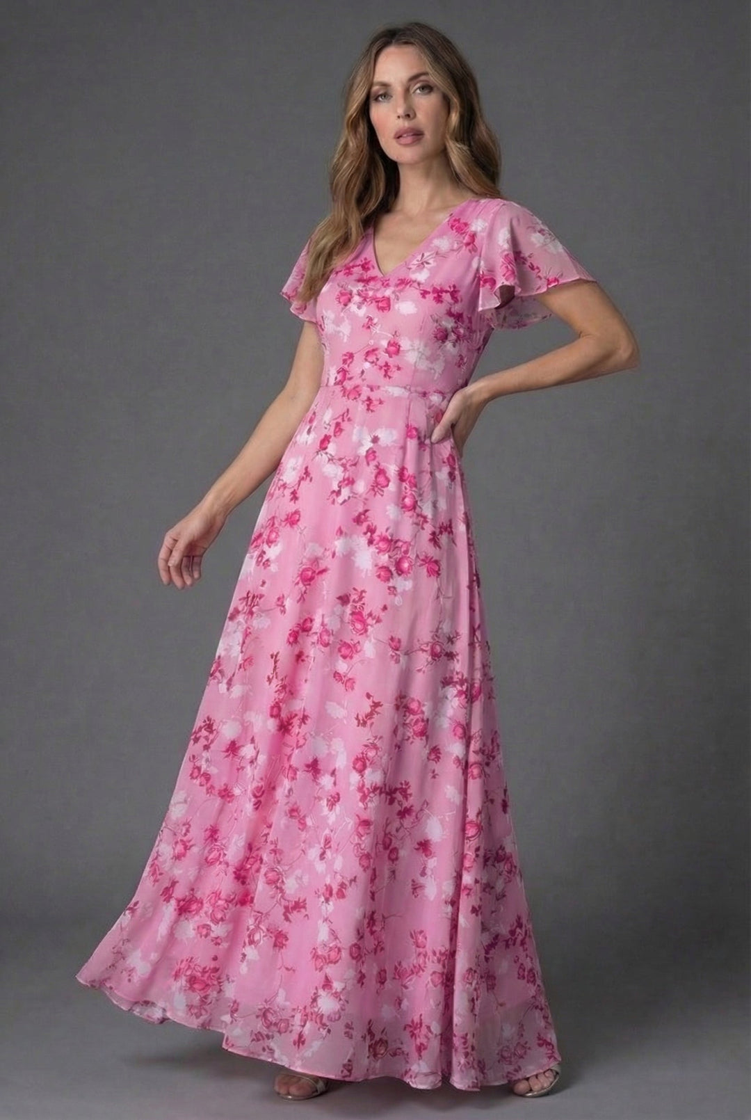 Elegant women's floral maxi dress, featuring a V-neck and flutter sleeves, ideal for formal occasions.