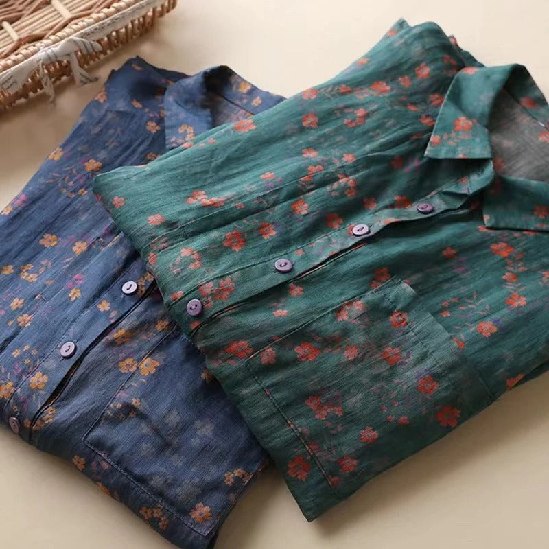 Vibrant floral print short-sleeve women's shirt, a versatile half-placket top for effortless ladies fashion.