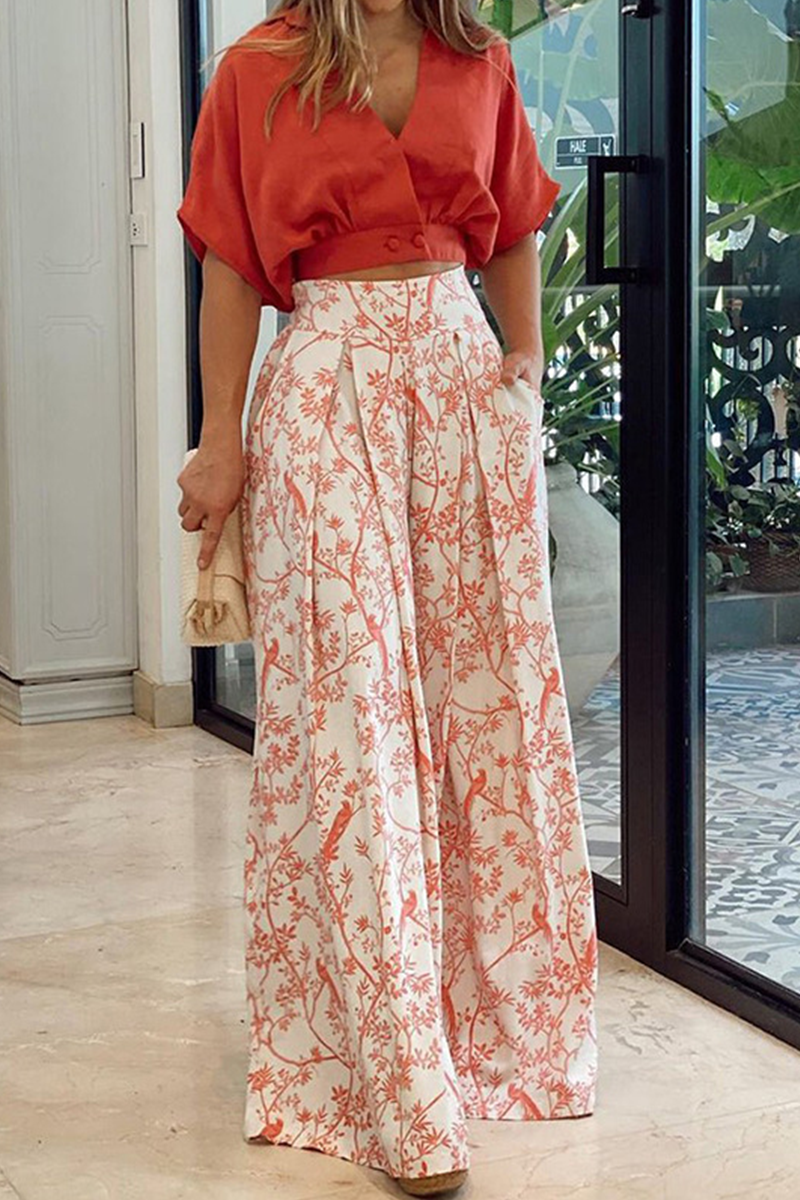 Summer vacation wear: Elegant floral maxi skirt and crop top set for women. Ideal for chic casual looks.
