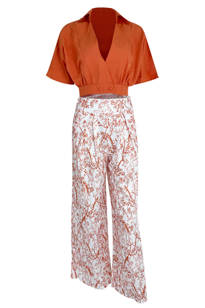 Fashionable women's floral maxi skirt and crop top set, an elegant casual summer outfit. Flowing & chic.