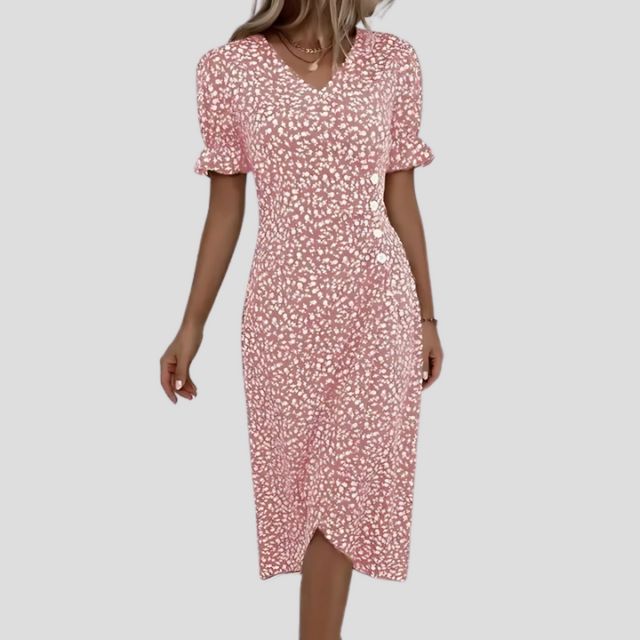 Casual women's button-front midi dress in a vibrant floral print, featuring a V-neck and puff sleeves.