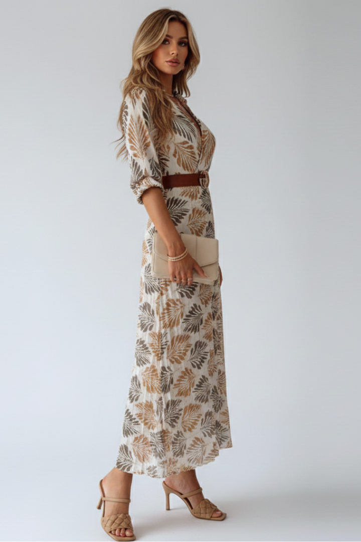 Casual women's long floral maxi dress with elbow sleeves, ideal for everyday wear.