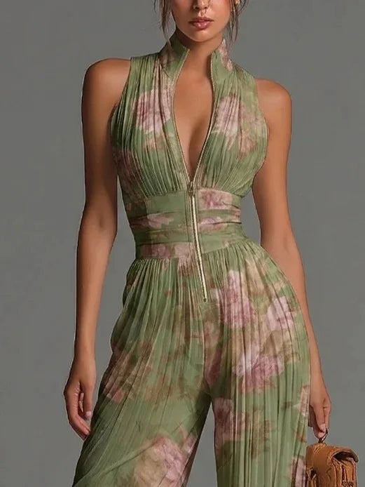 Vibrant floral print women's pleated halter jumpsuit, wide-leg style for comfortable and chic summer fashion.