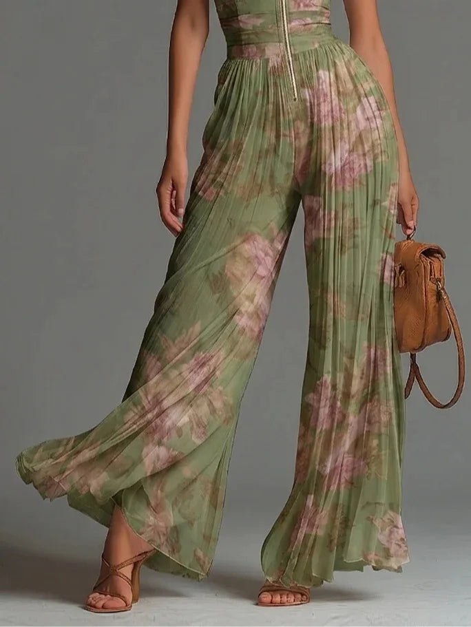 Flowy women's pleated floral halter jumpsuit, wide leg for elegant summer parties, vacations, or casual comfort.