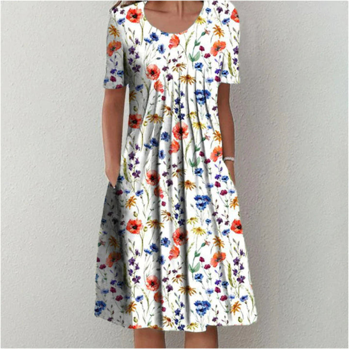 Women's elegant floral print dress with flattering tummy control, comfortable for everyday summer wear.