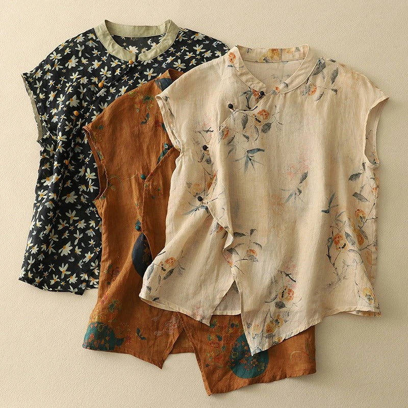 Casual elegant women's sleeveless blouse in a neutral floral print, complete with a mandarin collar.