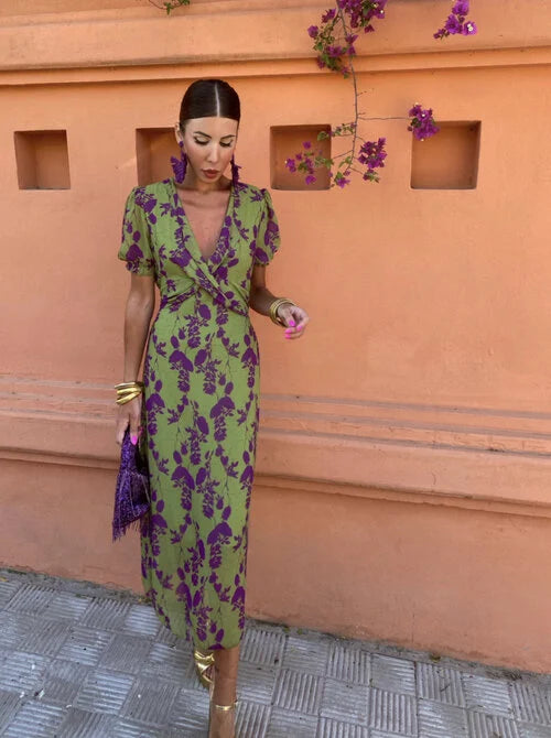 Vibrant floral summer dress for women, an elegant puff sleeve V-neck style perfect for parties.