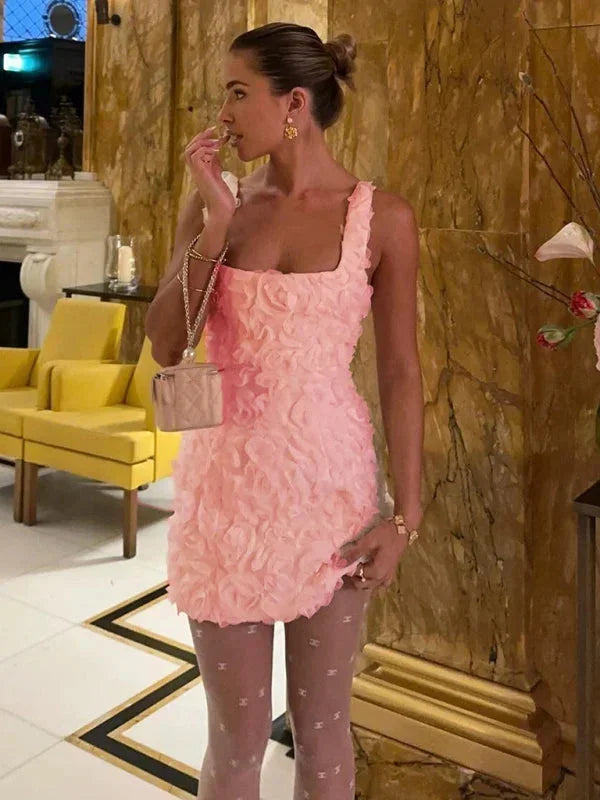 Women's elegant floral textured mini party dress, perfect for special occasions.