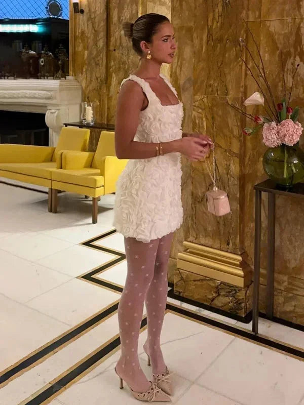 Elegant slim fit women's floral textured mini dress, ideal for parties, vacations, & events.