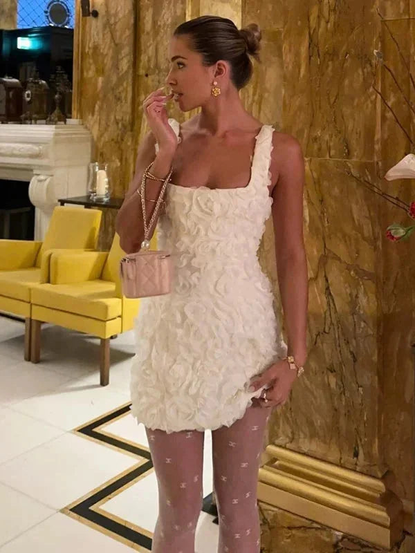 Sleeveless floral textured mini party dress for women, elegant cocktail attire.
